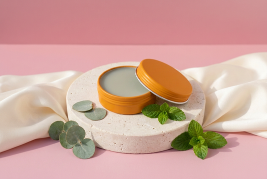 Clear Breathe Balm with ingredients and rose-pink background