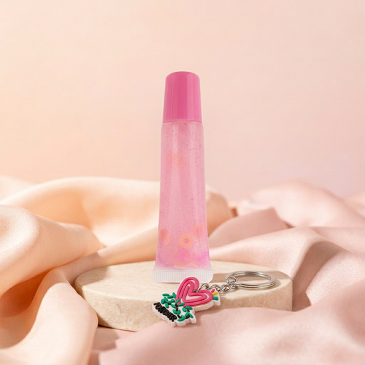 Marshmallow Lip Gloss in a peach-and-blush satin setting
